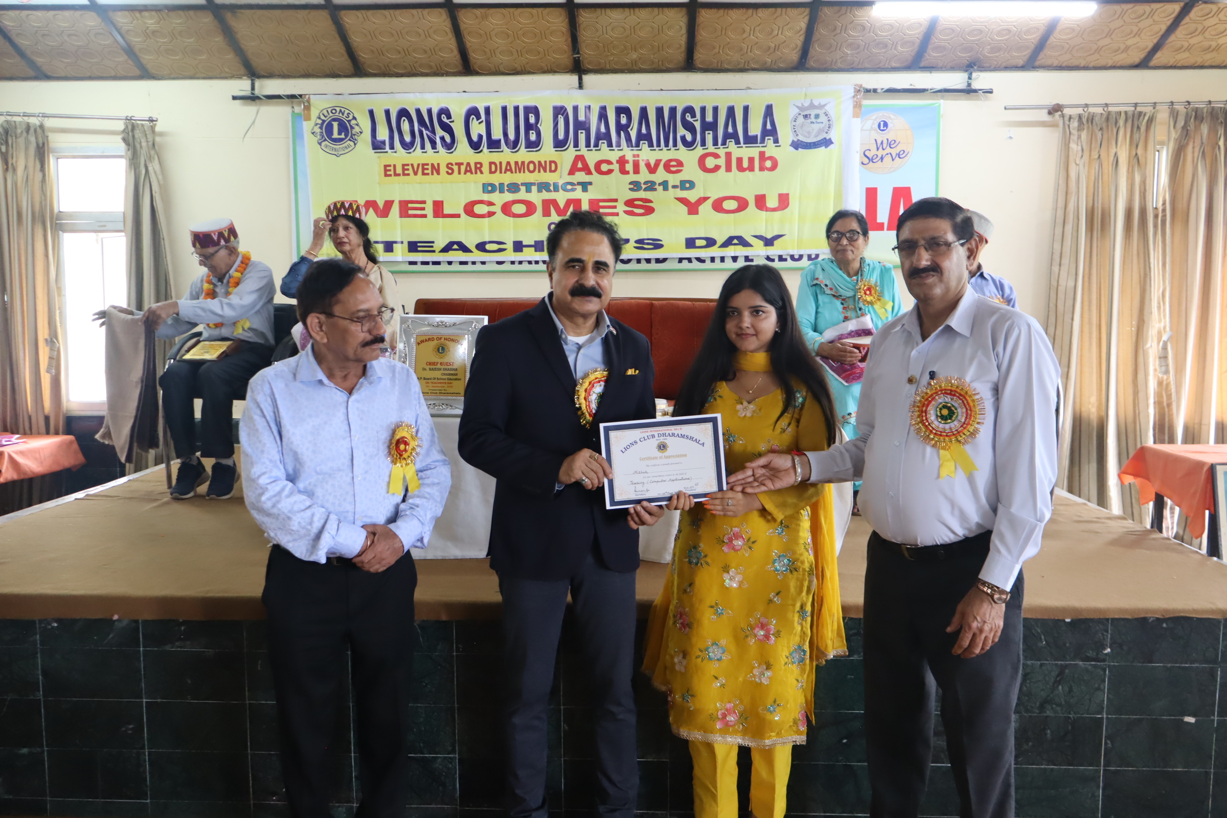 Hon'ble chairman Distributing Certificate to the Students of Lions club